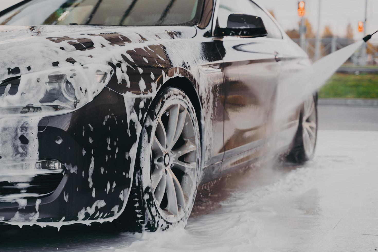Pressure washing a car headlight